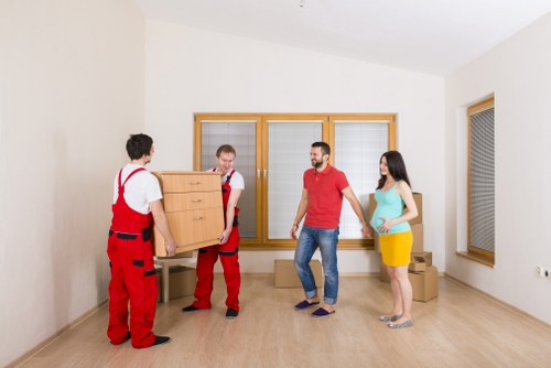 Kingston's reliable house removal team handling heavy furniture