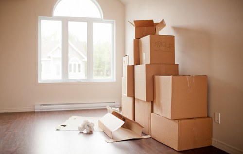 Movers loading furniture into a van