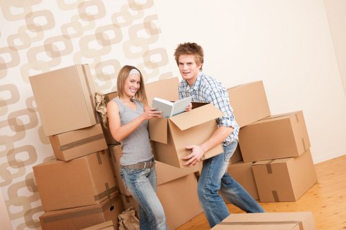 Efficient unpacking team setting up a new home